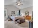 Bright bedroom with vaulted ceiling featuring a ceiling fan and natural light at 272 W Gennessee Dr, Zebulon, NC 27597