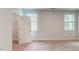 This bedroom features plush carpeting, neutral walls, and a walk-in closet at 2735 Hunter Woods Dr # 571, Apex, NC 27502