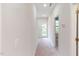 Hallway with carpet and a glass door leading to the backyard at 2735 Hunter Woods Dr # 571, Apex, NC 27502