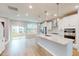 Modern kitchen featuring stainless steel appliances and a spacious center island at 2735 Hunter Woods Dr # 571, Apex, NC 27502