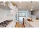 Gourmet kitchen with stainless appliances, gas range and bright lighting at 2735 Hunter Woods Dr # 571, Apex, NC 27502