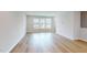Bright living room with large windows and beautiful hardwood floors throughout at 2735 Hunter Woods Dr # 571, Apex, NC 27502