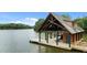 Private boat house including a private dock and area for entertaining at 310 Hidden Lake Dr, Youngsville, NC 27596