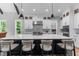 Well-equipped kitchen with a central island, stainless steel appliances, and stylish backsplash at 310 Hidden Lake Dr, Youngsville, NC 27596