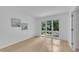 Bedroom with lots of natural light and a view to a lush backyard at 3205 Dell Dr, Raleigh, NC 27609