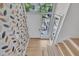 Modern entryway with hardwood floors and a view of the front yard at 3205 Dell Dr, Raleigh, NC 27609