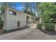 Charming two-story home with brick accents, landscaped entry, and driveway at 3205 Dell Dr, Raleigh, NC 27609