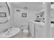 Bright laundry room complete with modern washer and dryer at 3205 Dell Dr, Raleigh, NC 27609
