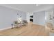 Spacious living room with stylish seating, hardwood floors, and neutral decor at 3205 Dell Dr, Raleigh, NC 27609