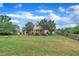 Beautiful backyard featuring a large yard, wooden fence and well-kept lawn at 35 Stratton Ct, Youngsville, NC 27596
