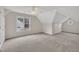 Carpeted bedroom featuring a ceiling fan and double hung windows for natural light at 35 Stratton Ct, Youngsville, NC 27596