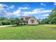 Well-maintained home featuring a lush green lawn and a charming facade, perfect for a serene and inviting atmosphere at 35 Stratton Ct, Youngsville, NC 27596