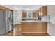 Modern kitchen with granite countertops and stainless steel appliances at 35 Stratton Ct, Youngsville, NC 27596