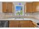 Updated kitchen with granite counters, undermount sink and tile backsplash at 35 Stratton Ct, Youngsville, NC 27596