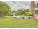 Spacious backyard features fenced garden and farm animals at 3679 Oak Lawn Farm Rd, Oxford, NC 27565