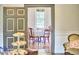 Charming dining room with seating, chandelier, and hardwood floors at 3679 Oak Lawn Farm Rd, Oxford, NC 27565