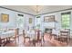 Elegant dining room featuring multiple tables and period decor with natural light at 3679 Oak Lawn Farm Rd, Oxford, NC 27565