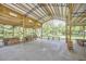 Spacious outdoor event space with high ceilings and views of the surrounding greenery at 3679 Oak Lawn Farm Rd, Oxford, NC 27565
