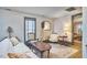Comfortable living room with natural light and hardwood floors at 3679 Oak Lawn Farm Rd, Oxford, NC 27565