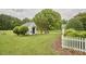 Exterior view of the yard and outbuildings on the property at 3679 Oak Lawn Farm Rd, Oxford, NC 27565