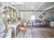 Cozy sitting room with antique furniture and eclectic decor at 3679 Oak Lawn Farm Rd, Oxford, NC 27565