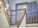 Close up of staircase with decorative railing and doorway in this home at 3679 Oak Lawn Farm Rd, Oxford, NC 27565