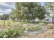 Exterior view of a large yard, garden and various outbuildings on this property at 3679 Oak Lawn Farm Rd, Oxford, NC 27565
