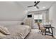 Bedroom features a ceiling fan, desk, chair, and carpet flooring at 3728 Marwick Ct, Wendell, NC 27591