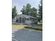 Charming single-story home with a covered front porch and fenced yard at 40 Bait Rd, Dunn, NC 28334