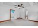 Bright and airy attic featuring neutral carpet, trim, and ample sunlight, ideal for flexible living space at 407 Hillcrest Ave, Burlington, NC 27215