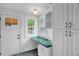 Kitchen nook with green countertop workspace and door leading to the outside at 407 Hillcrest Ave, Burlington, NC 27215