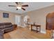 Spacious living room with hardwood floors offering views into the dining room and ample natural light at 407 Hillcrest Ave, Burlington, NC 27215