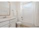 Clean bathroom featuring a combination shower and tub with a stylish vanity at 4729 Adler Pass, Raleigh, NC 27612