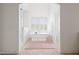 Bathroom showcases a standalone tub and seamless glass shower at 4729 Adler Pass, Raleigh, NC 27612