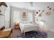 Bright bedroom with natural light, decor, and a comfortable bed at 4729 Adler Pass, Raleigh, NC 27612
