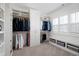 Spacious walk-in closet with custom shelving and ample storage space at 4729 Adler Pass, Raleigh, NC 27612
