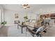 Inviting living room featuring a comfortable sofa, modern chairs, and an open layout connected to the kitchen at 5081 Pioneer Dr, Sanford, NC 27330