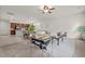 Open-concept living room with modern furnishings, a comfortable sofa, and seamless access to the kitchen at 5081 Pioneer Dr, Sanford, NC 27330