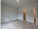 Bedroom showcasing neutral walls, modern flooring, and walk in closet, a peaceful retreat at 511 Sweet Potato Lane # 10, Nashville, NC 27856