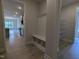Welcoming entryway with built-in bench and storage, leading to a bright, open-concept living space at 511 Sweet Potato Lane # 10, Nashville, NC 27856