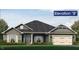 Charming single-story home with stone accents, a covered porch and two-car garage at 511 Sweet Potato Lane # 10, Nashville, NC 27856