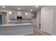 Elegant kitchen featuring granite countertops, pendant lighting, and ample cabinet space at 511 Sweet Potato Lane # 10, Nashville, NC 27856