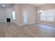Bright living room with a fireplace and open access to the dining room at 511 Sweet Potato Lane # 10, Nashville, NC 27856