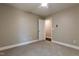 Bedroom features include neutral walls, carpet flooring, and a ceiling fan at 5200 Fieldwood Ct, Raleigh, NC 27616
