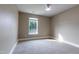 Bedroom with neutral walls, carpet flooring, a ceiling fan and a single window at 5200 Fieldwood Ct, Raleigh, NC 27616