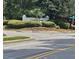 Community sign for Cardinal Grove, surrounded by lush greenery at 5200 Fieldwood Ct, Raleigh, NC 27616