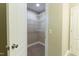 Spacious walk-in closet with carpeted floor and multiple wire rack shelving units at 5200 Fieldwood Ct, Raleigh, NC 27616