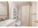 Bathroom with vanity, shower, toilet and shelf for toiletries at 559 Blue Pond Rd, Clayton, NC 27520