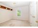 Bedroom with window, carpet, and painted walls at 559 Blue Pond Rd, Clayton, NC 27520