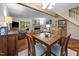 Spacious living area with an open floor plan, cozy fireplace, and comfortable seating arrangements at 6021 Dixon Dr, Raleigh, NC 27609